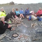 Cooking our sausages on the beach.