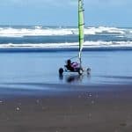 Me, whizzing through the wet sand!